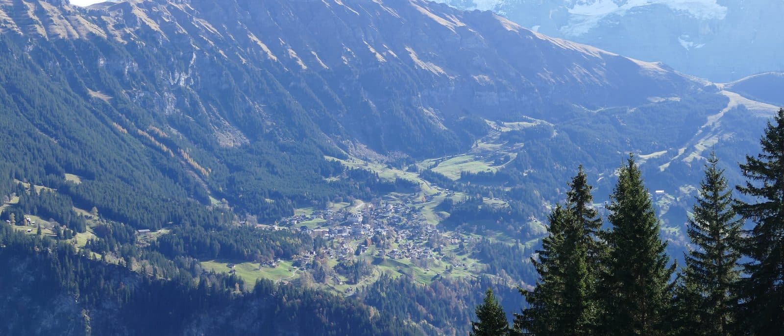 Wengen seen from Isenfluh, with the Eiger, Mönch and Jungfrau behind.